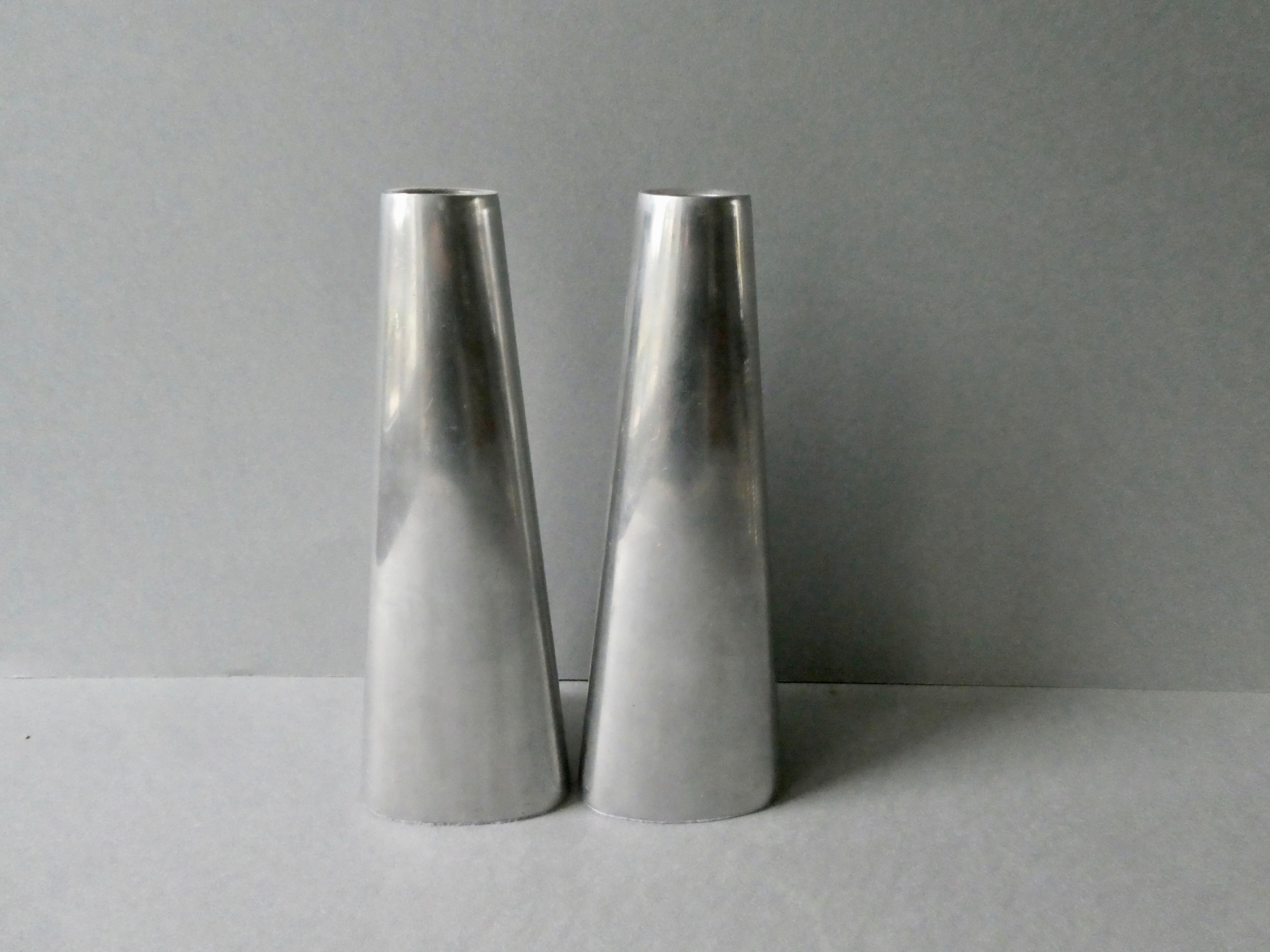 Pair of aluminum candle holders from the 80s