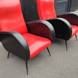 Pair of red and black faux leather armchairs