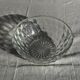 Small vintage glass bowl with a cube pattern.
