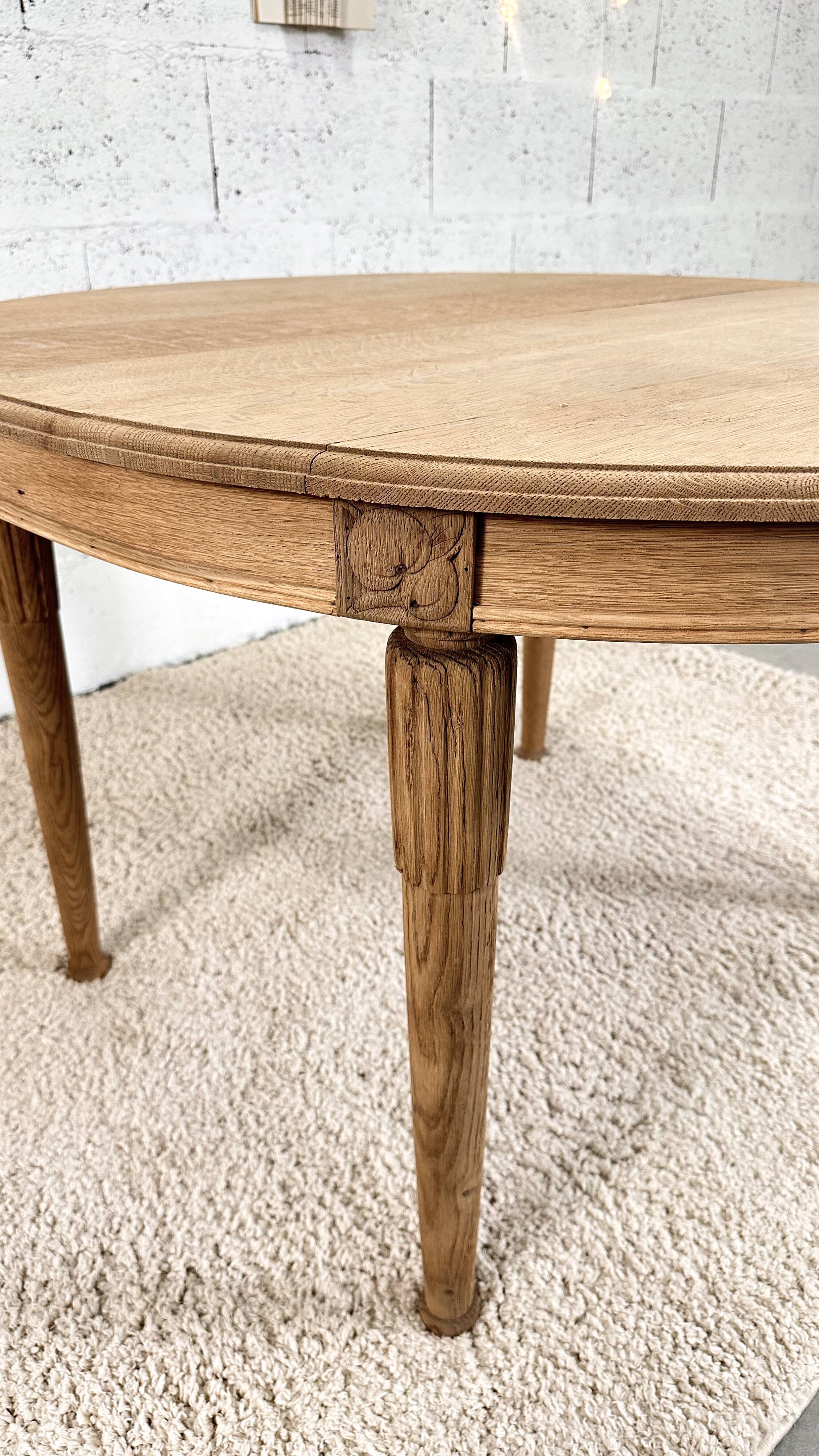 Old oval raw wood table