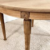 Old oval raw wood table