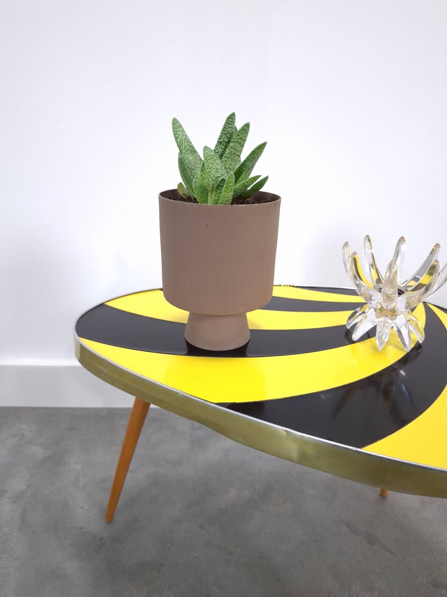 Vintage 1950s black and yellow striped formica table, plant table.