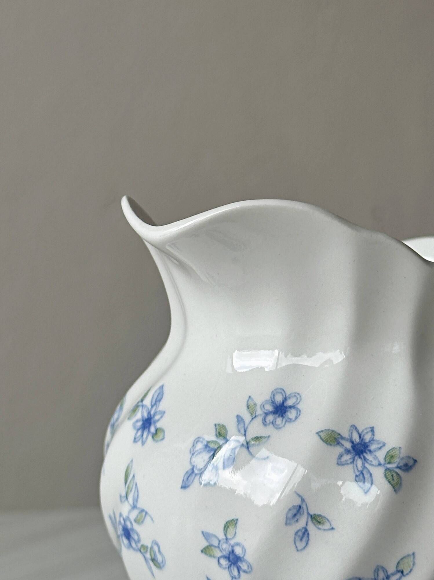 White porcelain creamer with small blue flowers – Milk jug