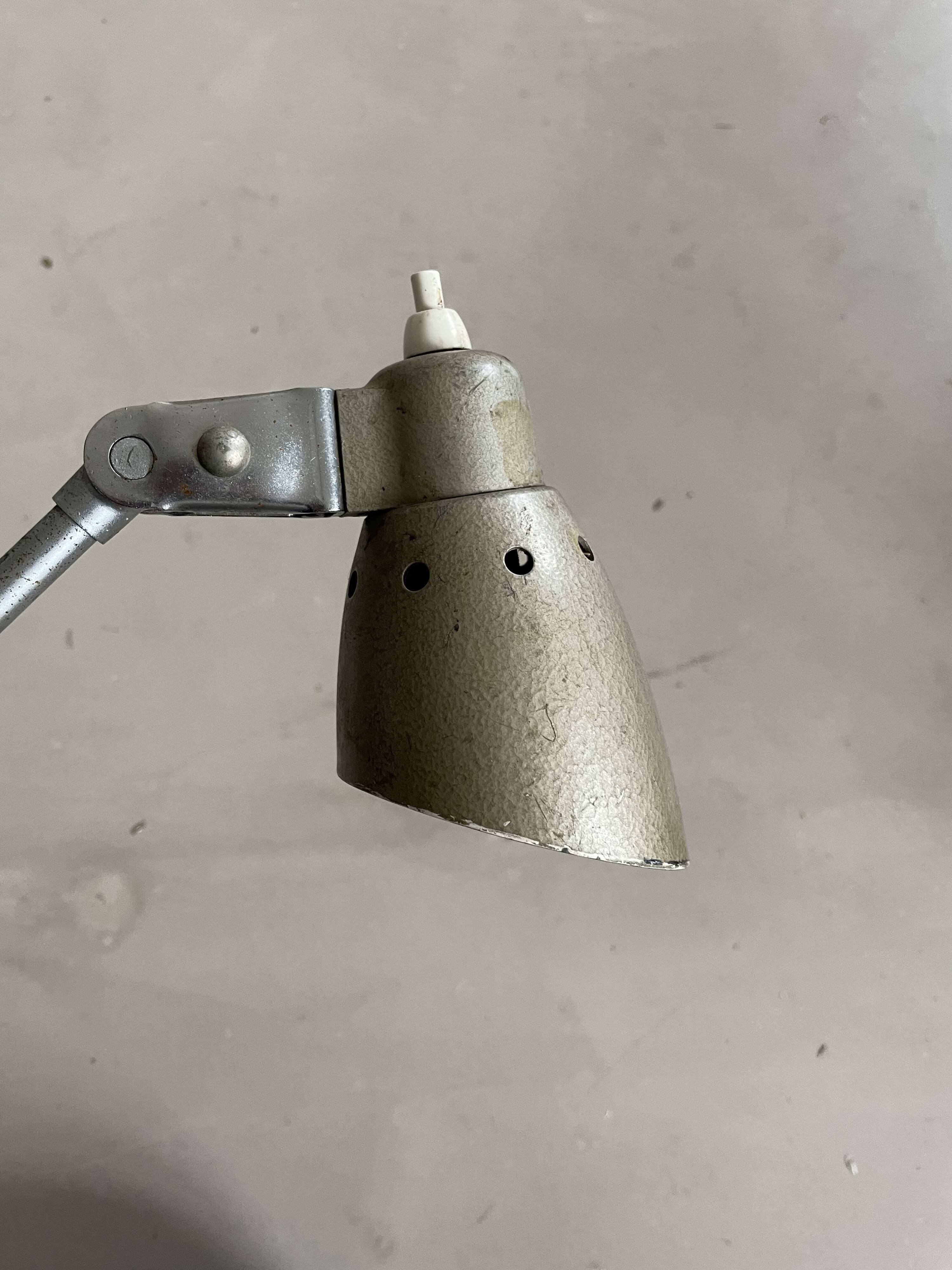 Old industrial articulated lamp