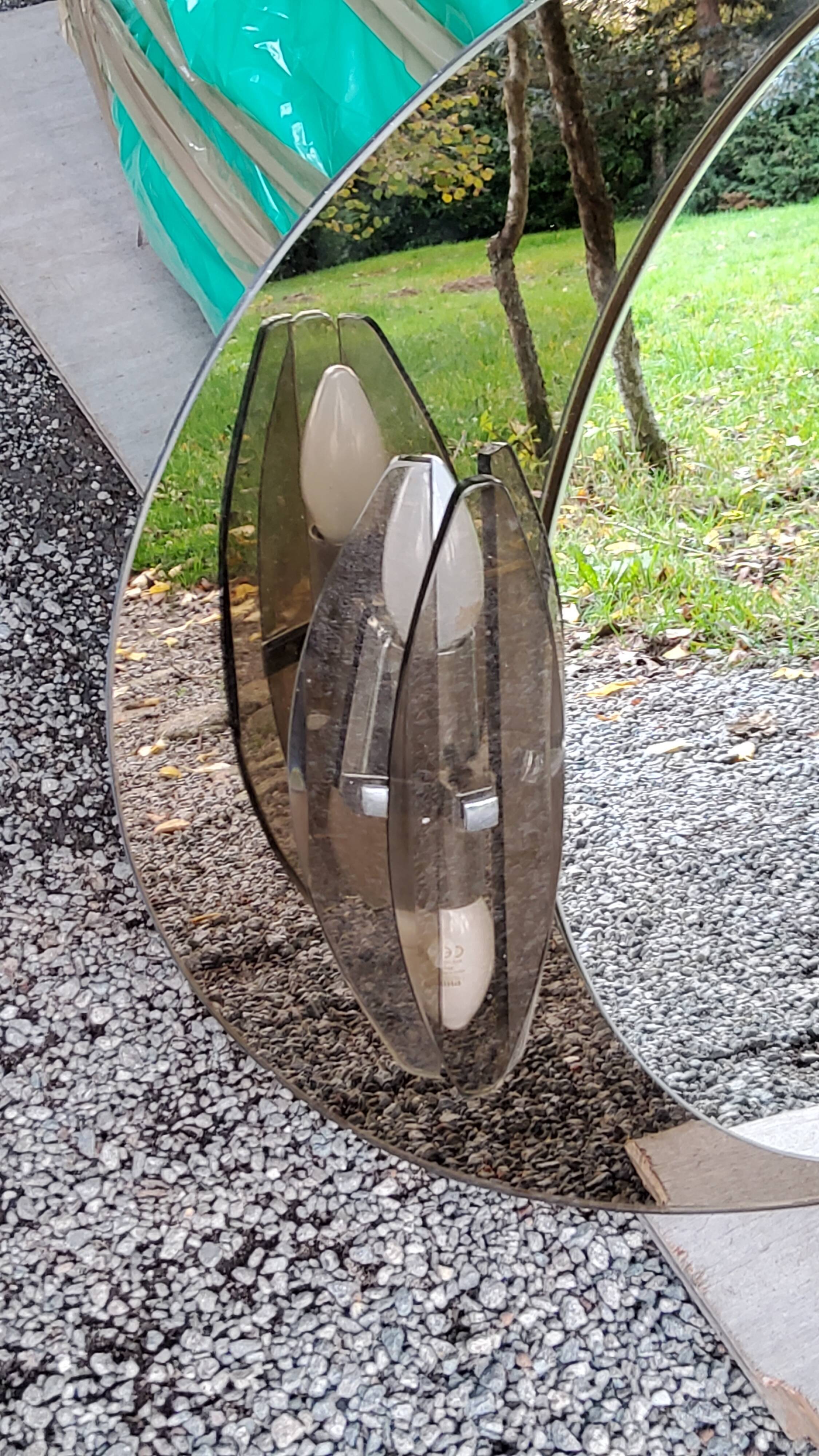 Oval mirror with 2 double tain sconces by Antonio Lupi from the 80s, 69x55 cm