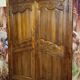 Louis XV period wardrobe façade, architectural elements in solid wood, richly carved.