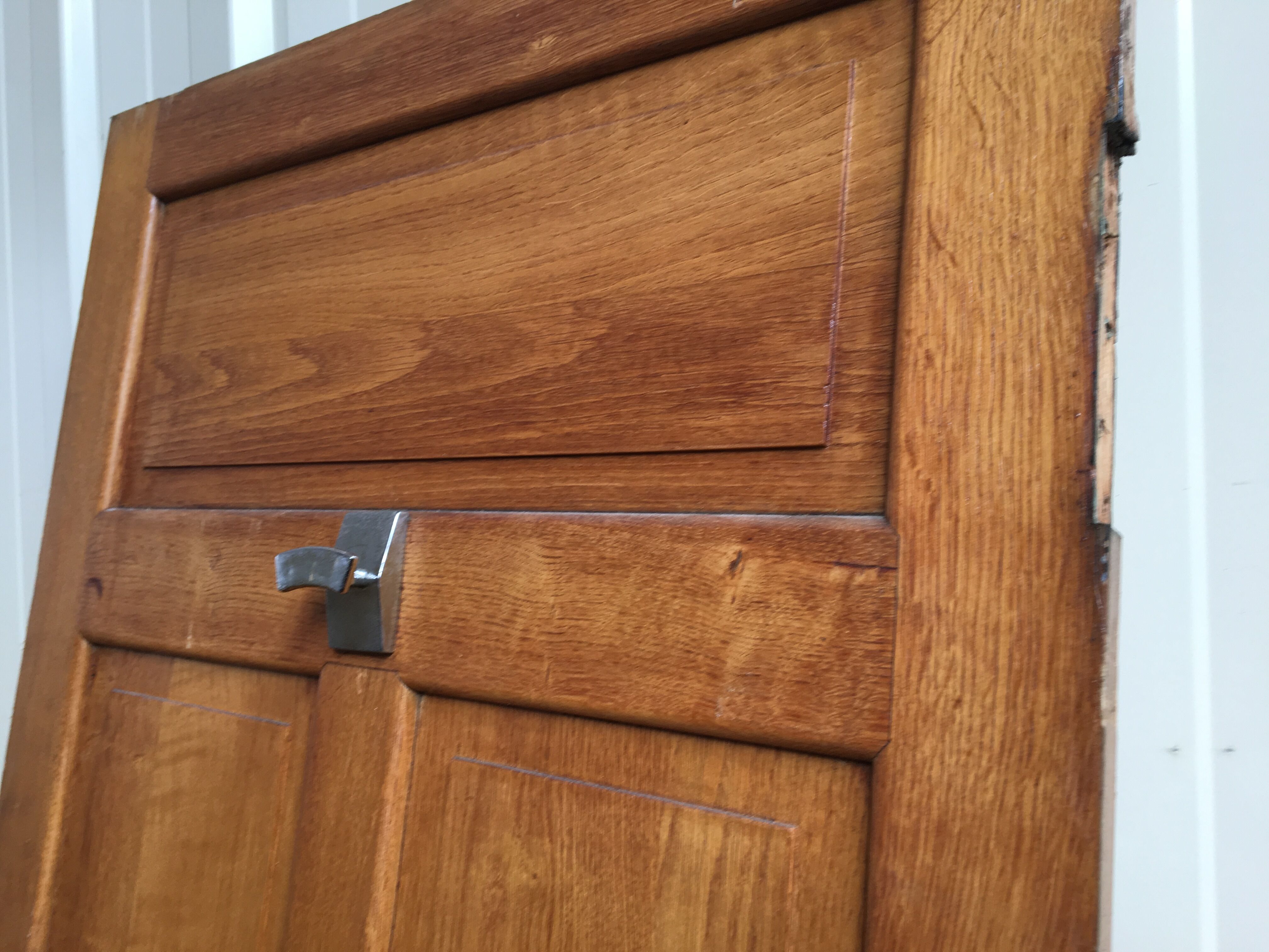 old sanitary door of the bank of France in oak