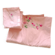 Nappe rose avec couronne de fleurs + 10 serviettes