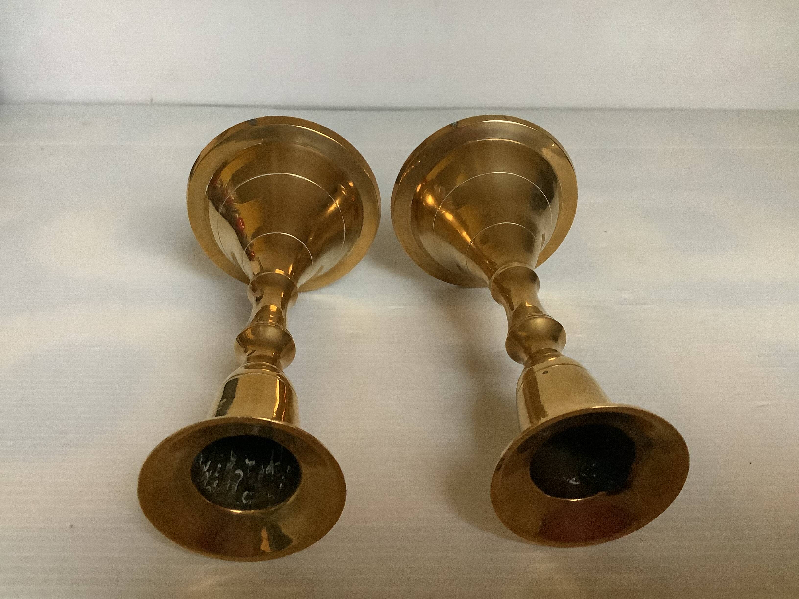 Pair of small brass tulip-shaped candlesticks
