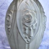 Glass vase decorated with flowers