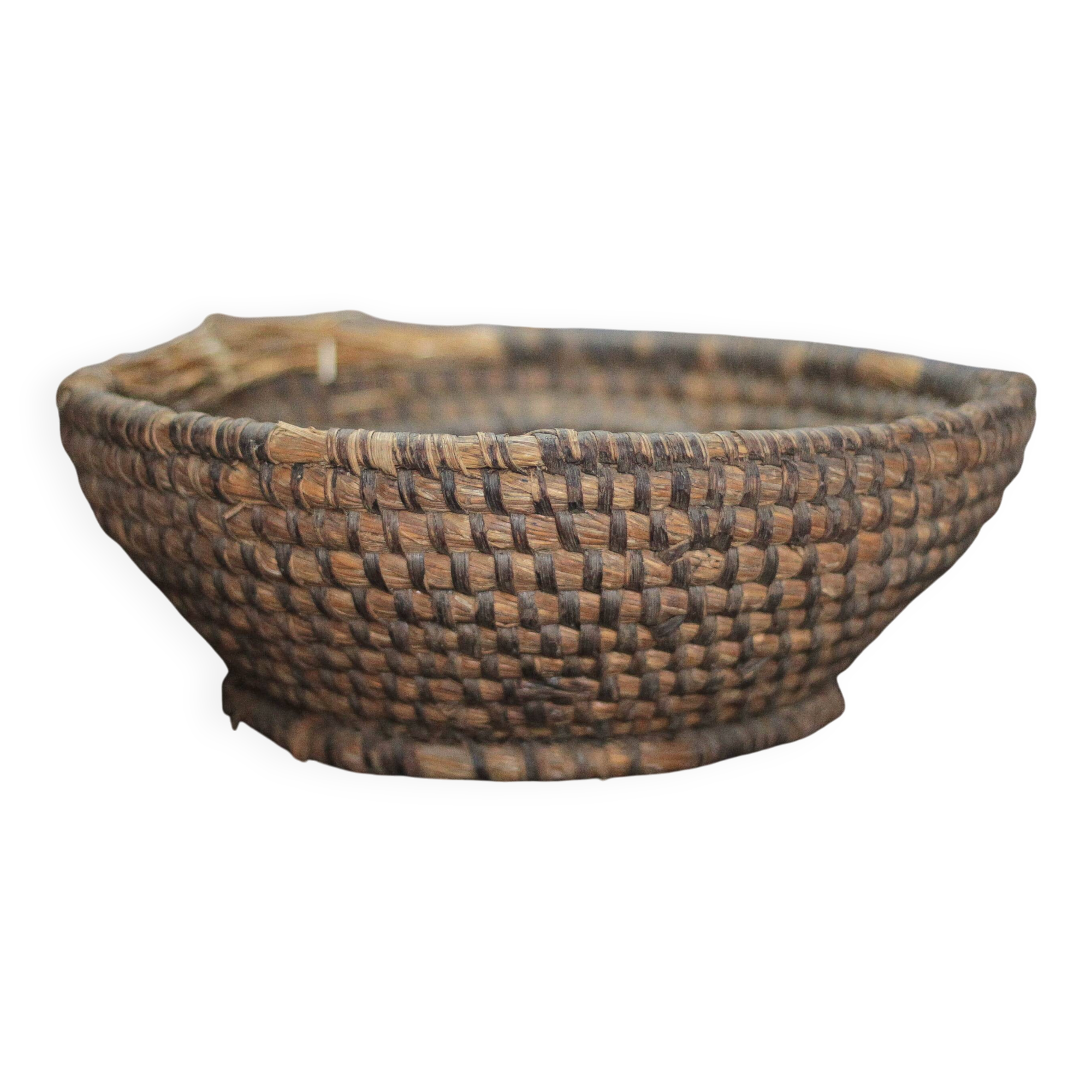 Old wicker basket, straw and bramble, woven basket, countryside.