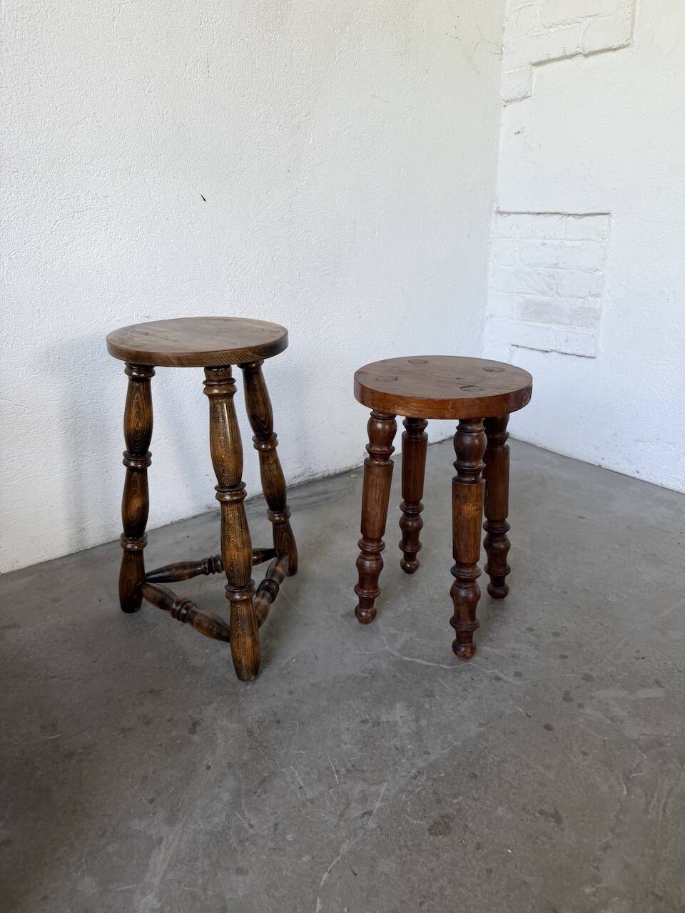 Pair of antique stools with turned legs.