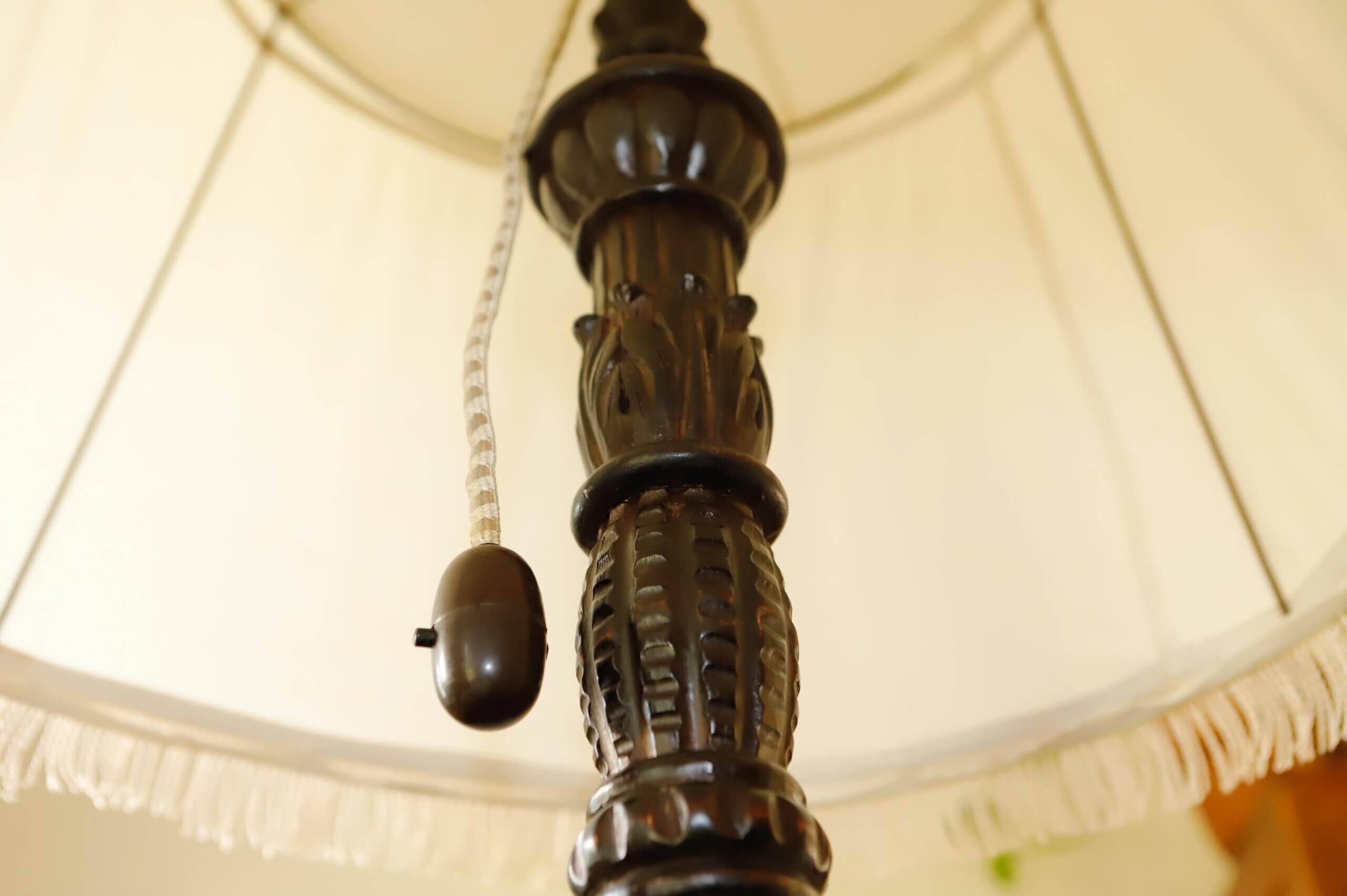 Antique floor lamp with lion motif