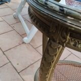 Old oval table with marble top, Louis XVI style