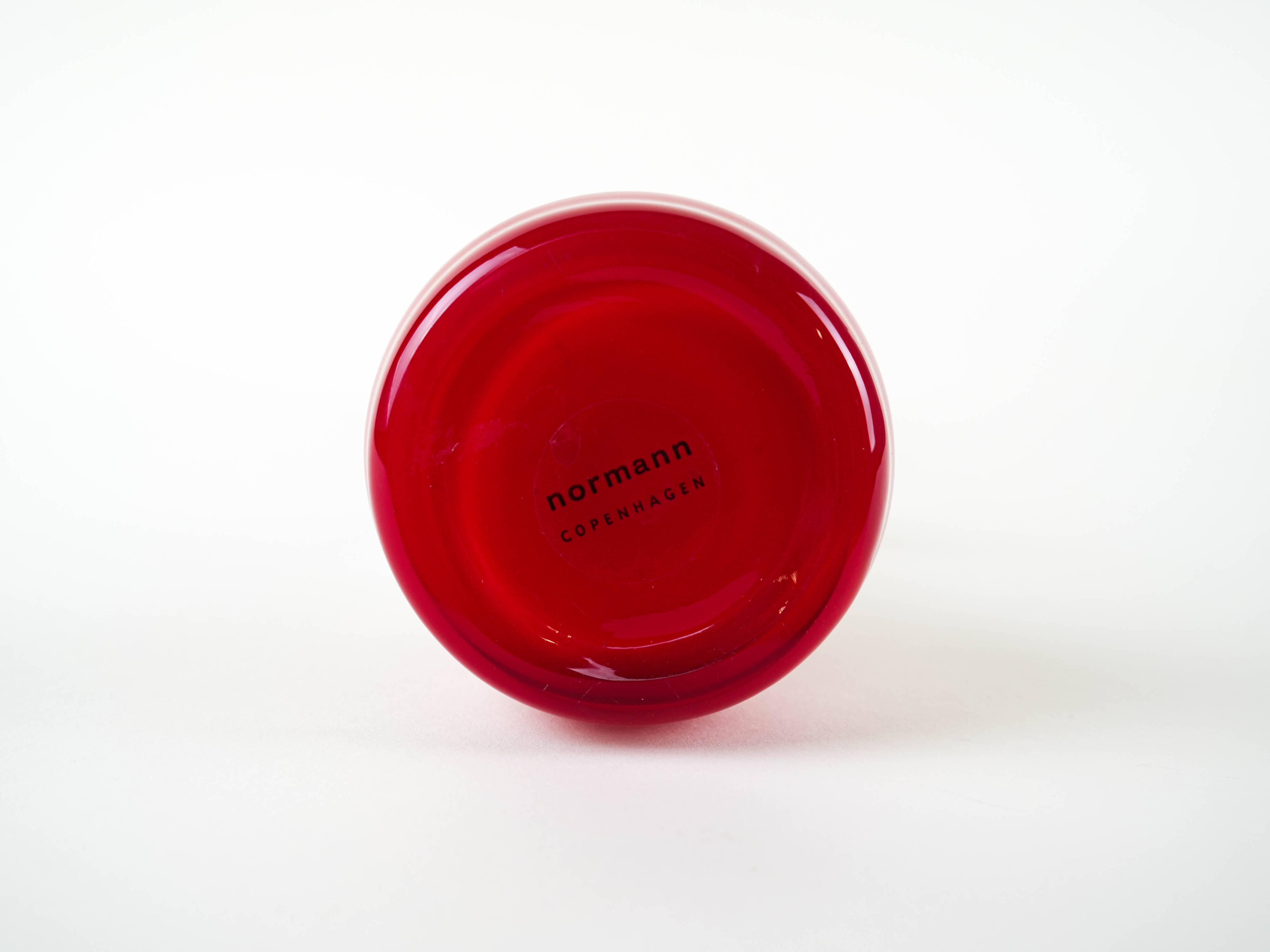 Red vase, Swing Vase, Danish design, manufactured by Normann Copenhagen