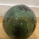 Floating fishing ball in glass