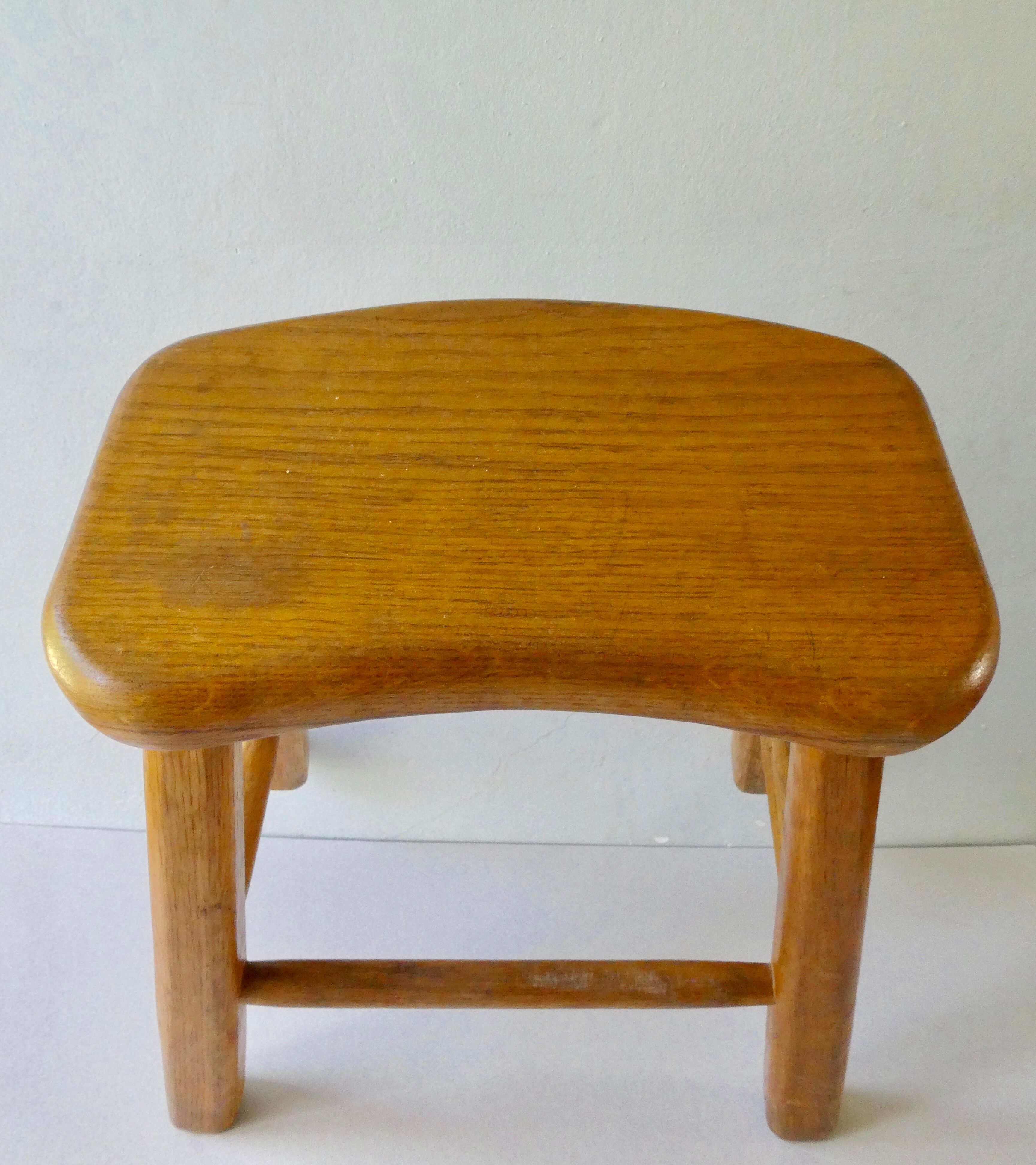 Light wood stool, free-form seat
