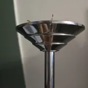 Vintage globe-style holophane on a chrome stem.