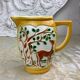Jug with slipware decoration