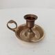 Vintage brass candle holder in gold.