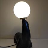 Lampe otarie noire irisée bleue en terre cuite