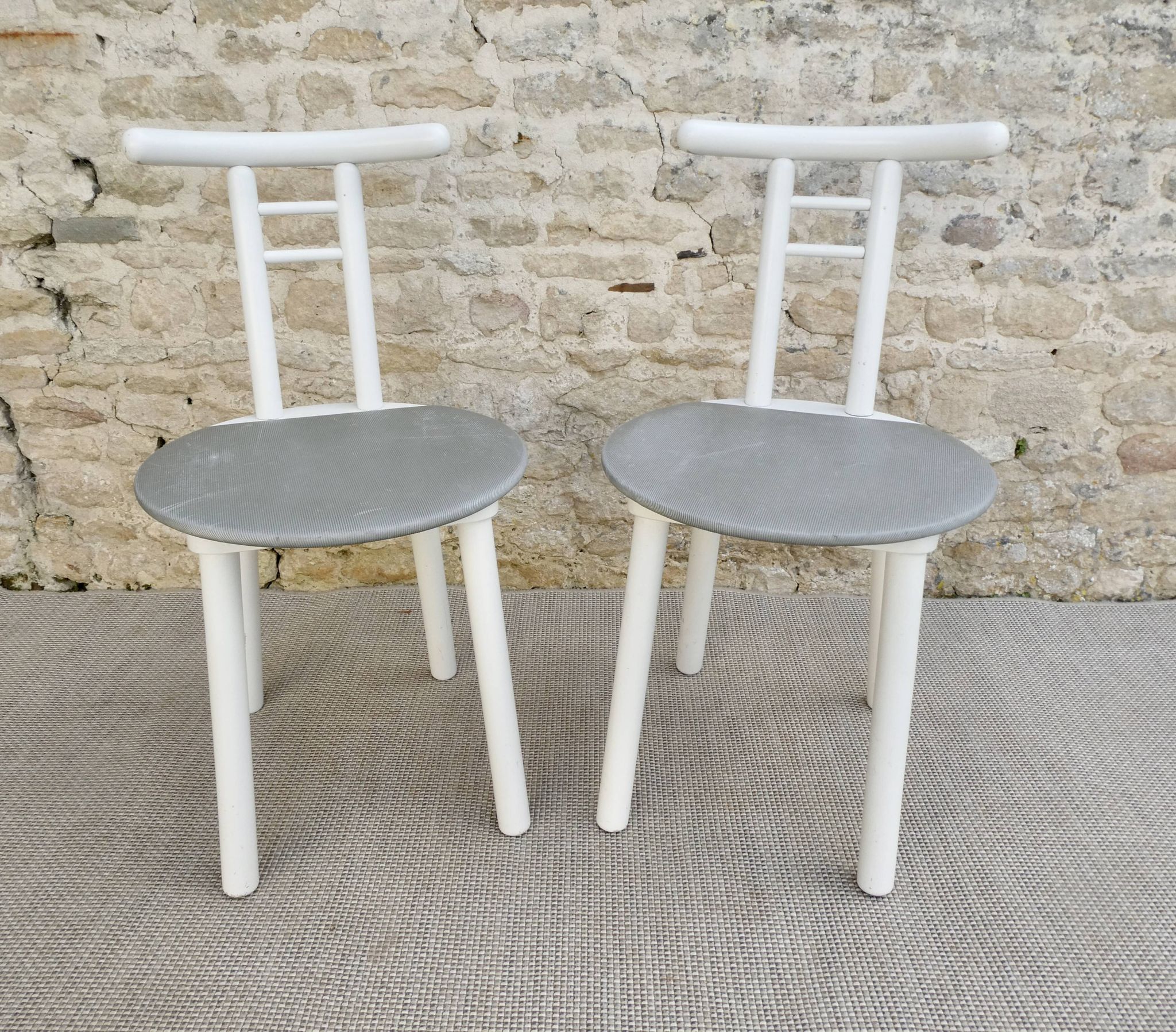 Pair of wooden and Skaï chairs from the 80s, Italy