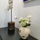 Vase boule "papillons" signé Longwy