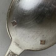 4 petites cuillers en métal argenté