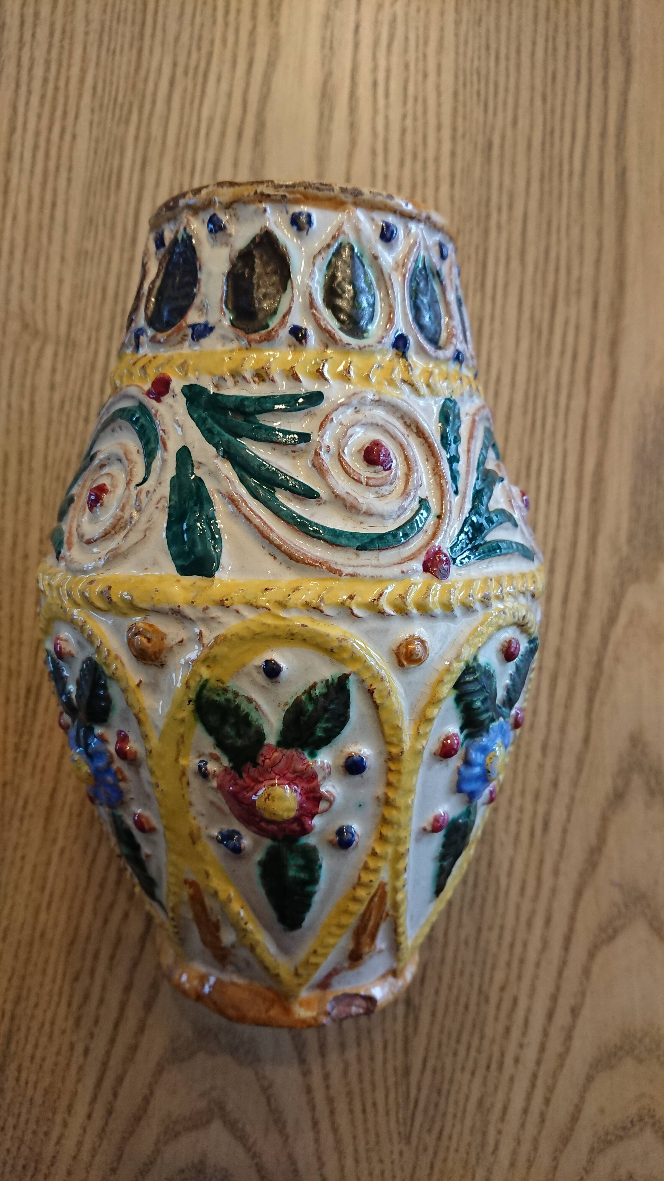 Hand-carved and hand-painted vase