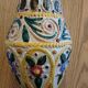 Hand-carved and hand-painted vase