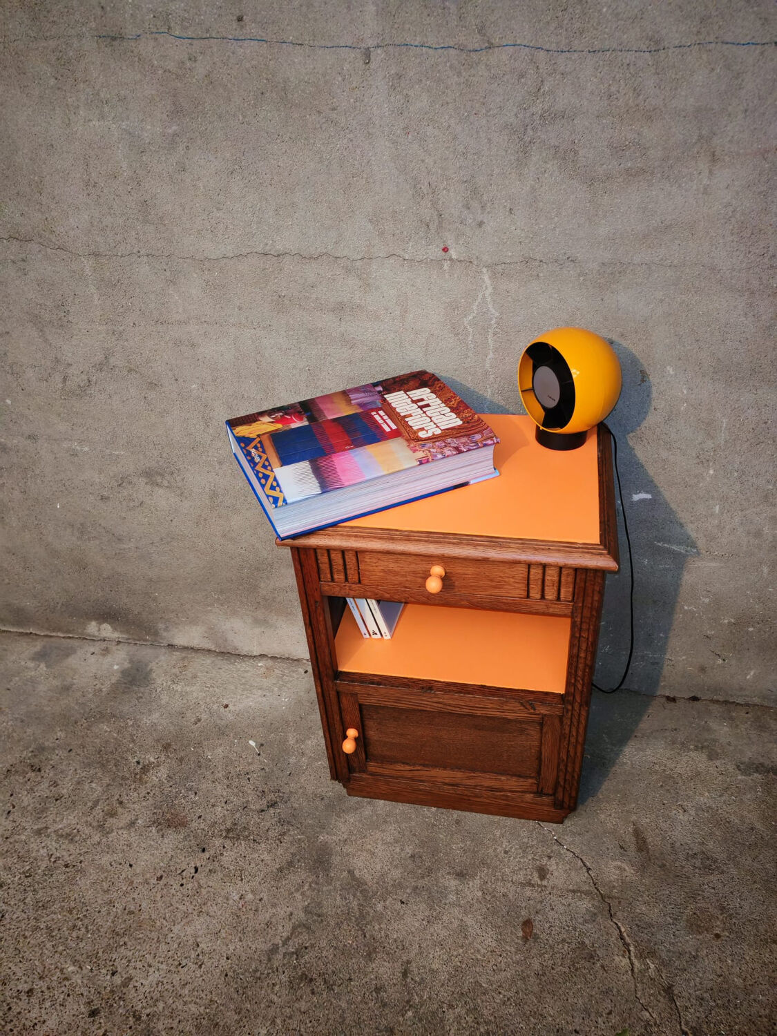 Art Deco orange bedside table