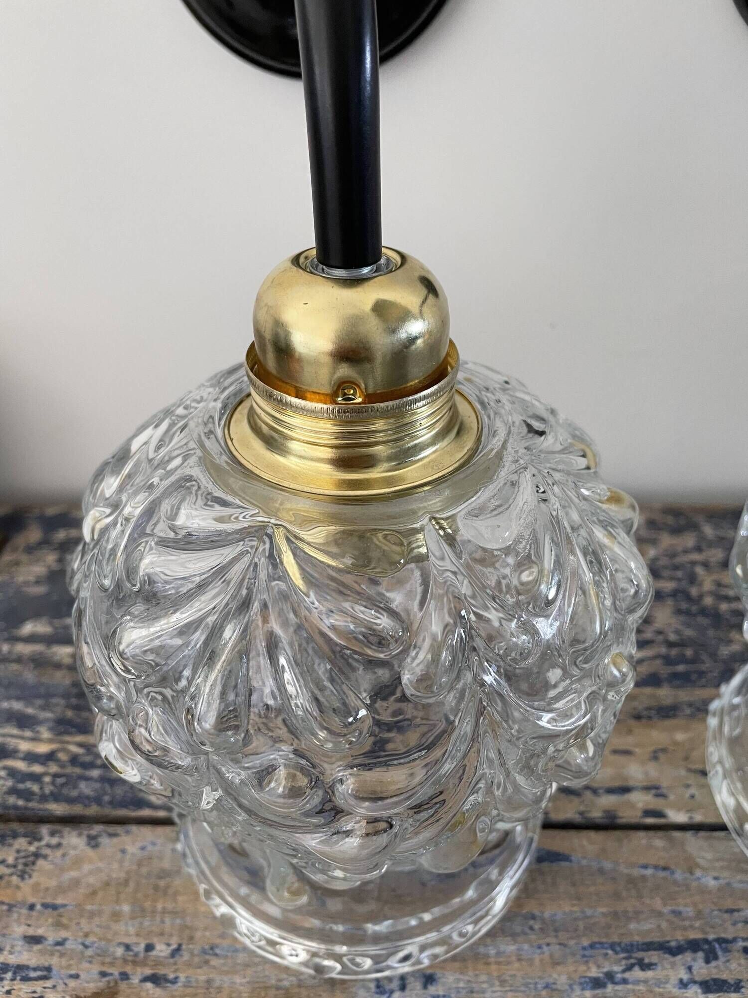 Pair of vintage electrified to nine-piece chiseled glass wall lamps