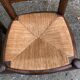 Duo of vintage rustic straw straw chairs in oak.