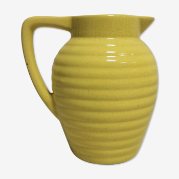 Yellow pitcher in slurry, faience onnaing frères