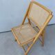 Folding chair in cannage