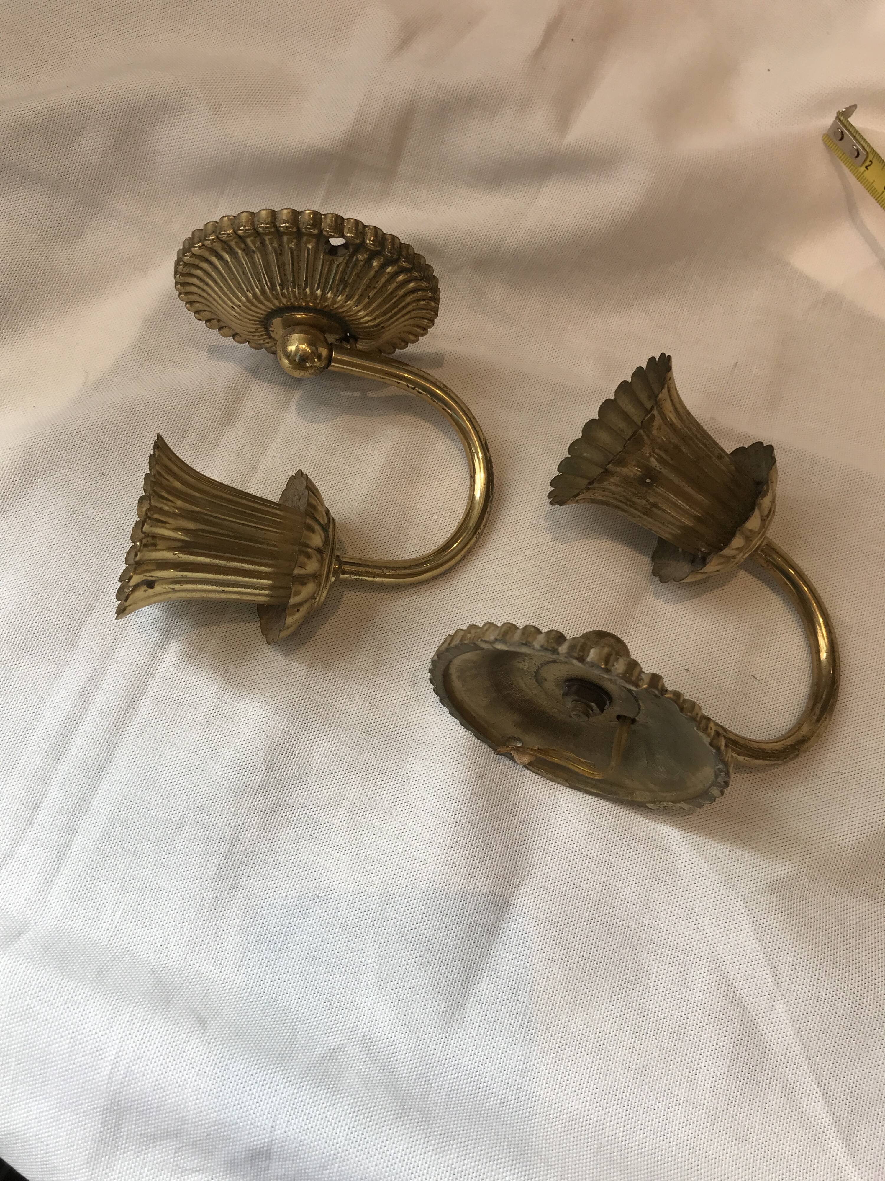 Pair of golden wall light