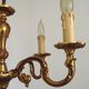 Vintage French traditional style bronze chandelier with 5 lights featuring acanthus leaf details.
