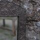 Oriental mirror in chiseled metal – beveled, for placing on a surface or hanging