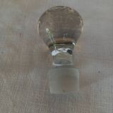 Round carafe in chiseled glass