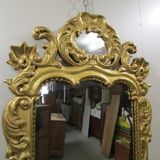 Miroir ancien en bois doré