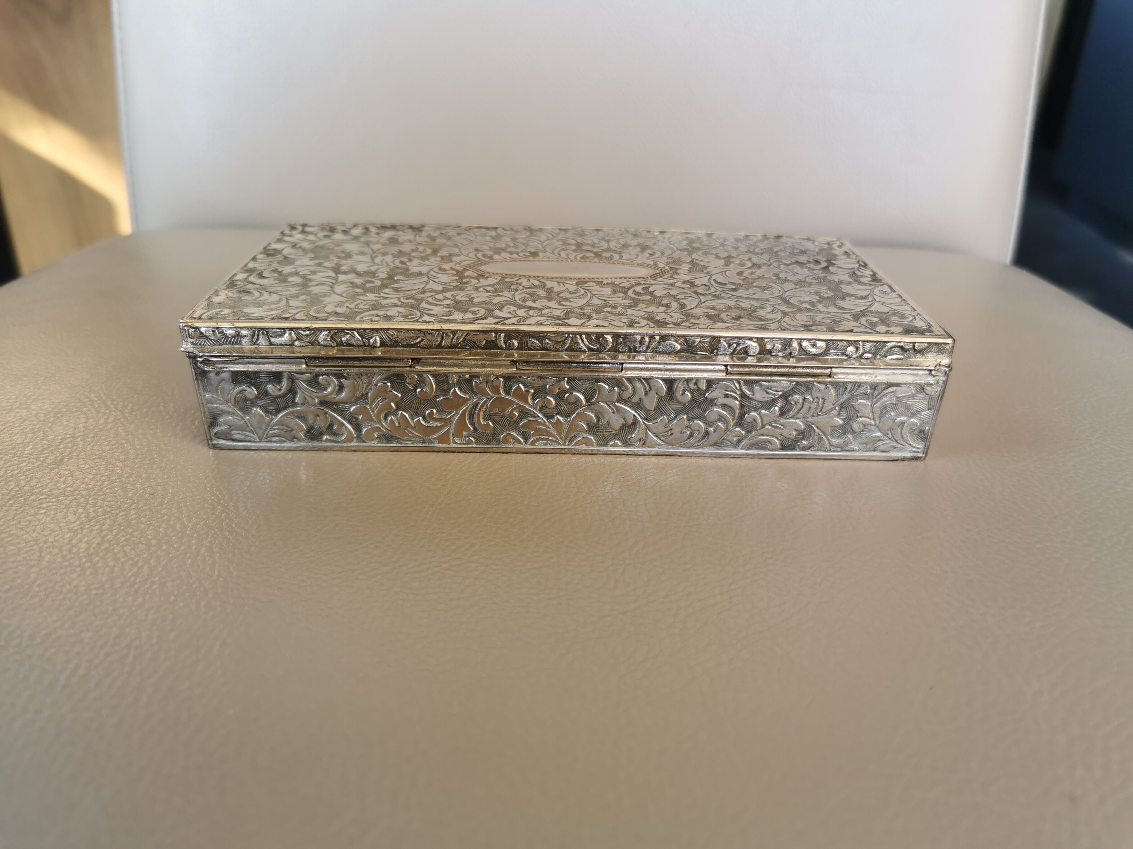 Old box in chiseled silver metal