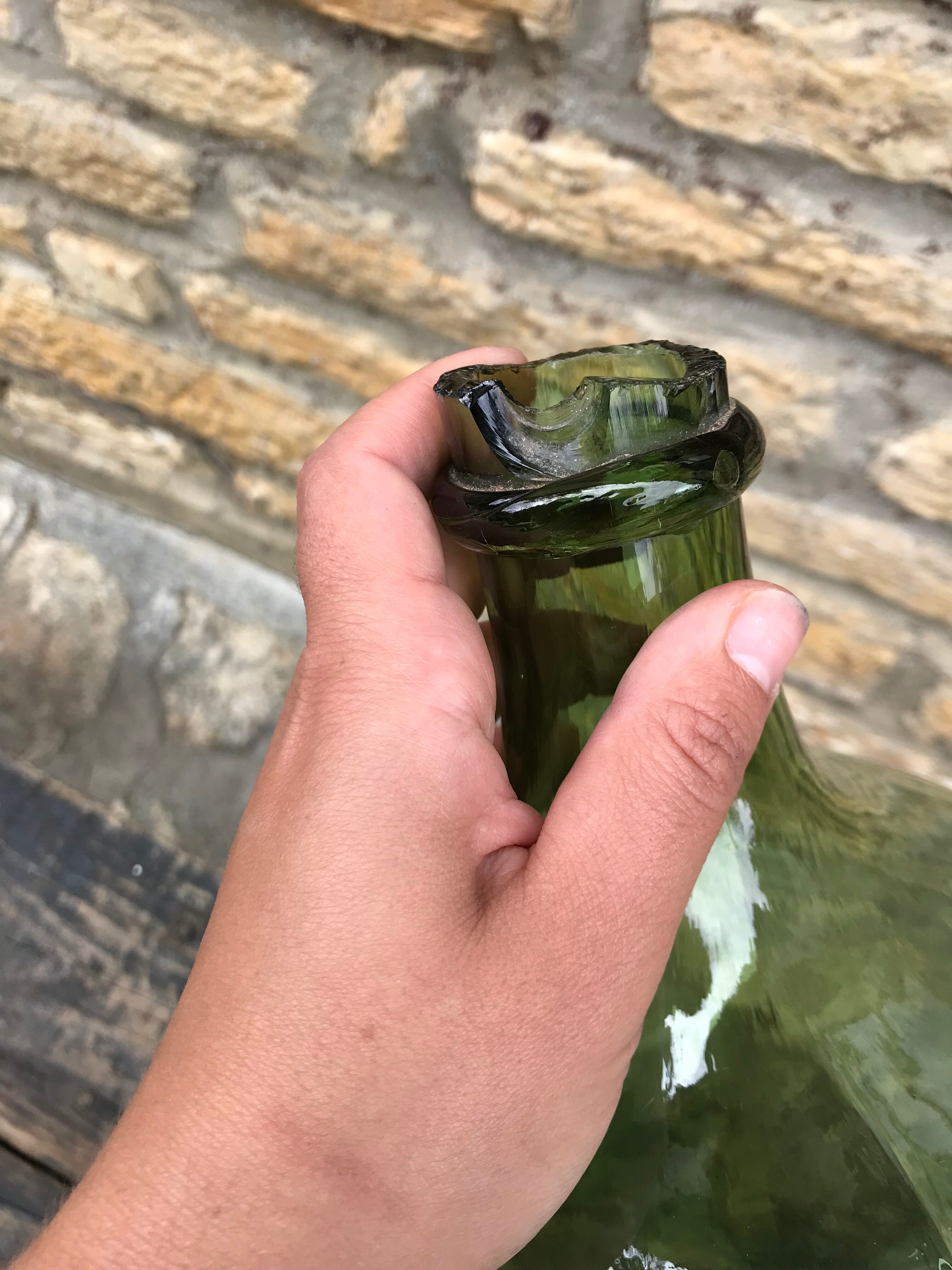Green and oval demijohn