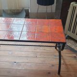 Wrought iron and orange ceramic coffee table