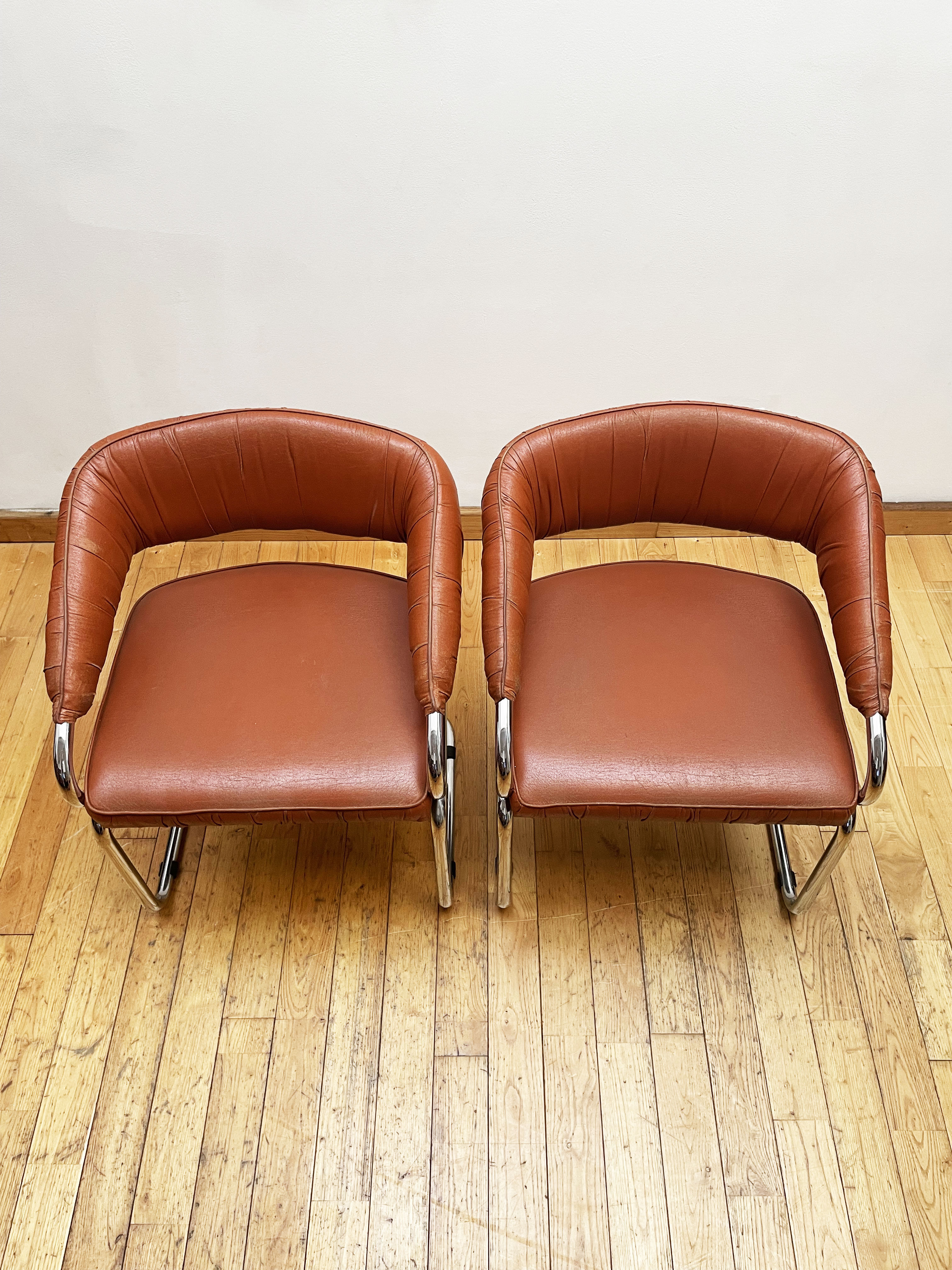 Pair of leather armchairs year 70