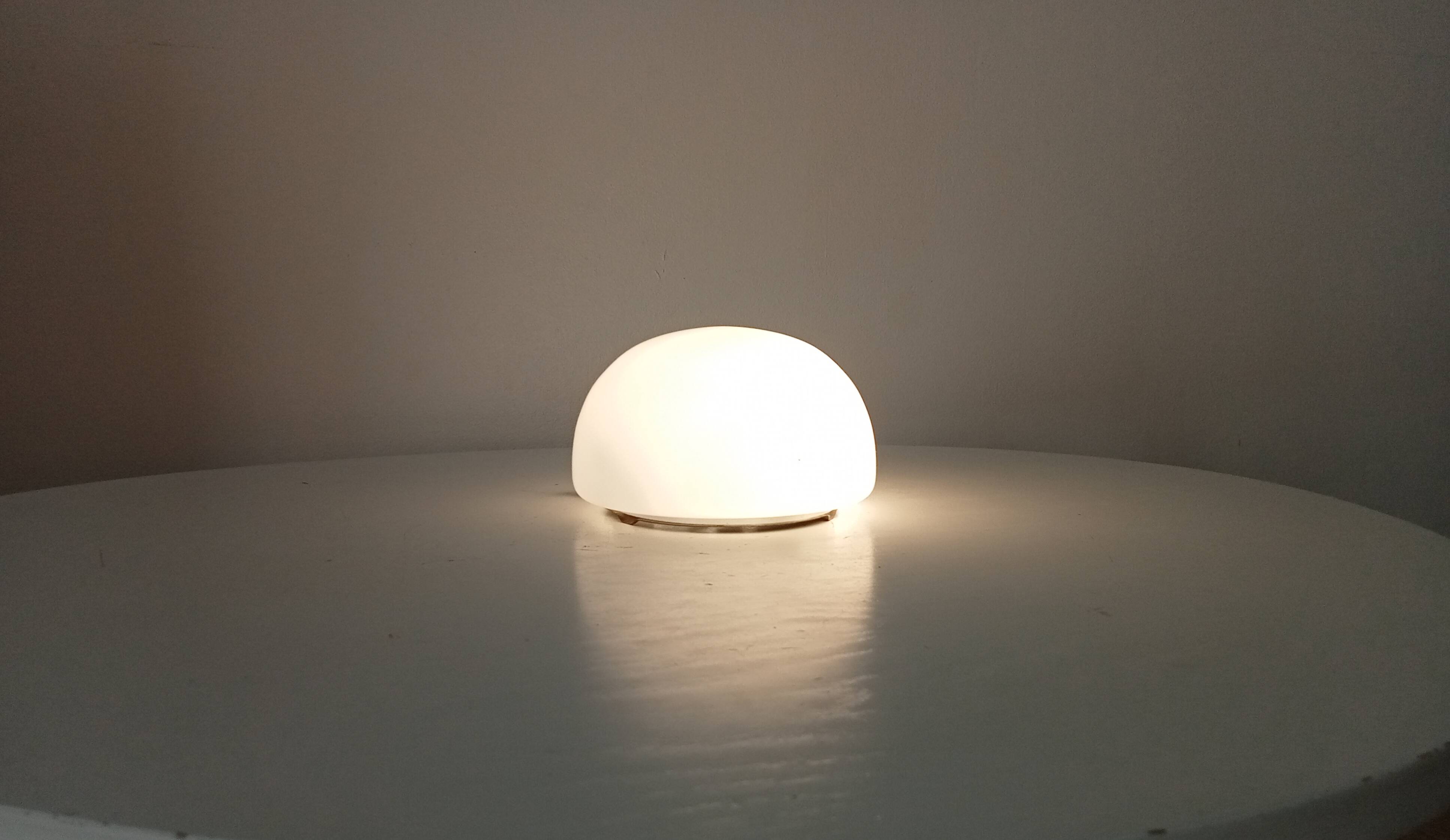 Vintage opaline wall light from the 1960s.