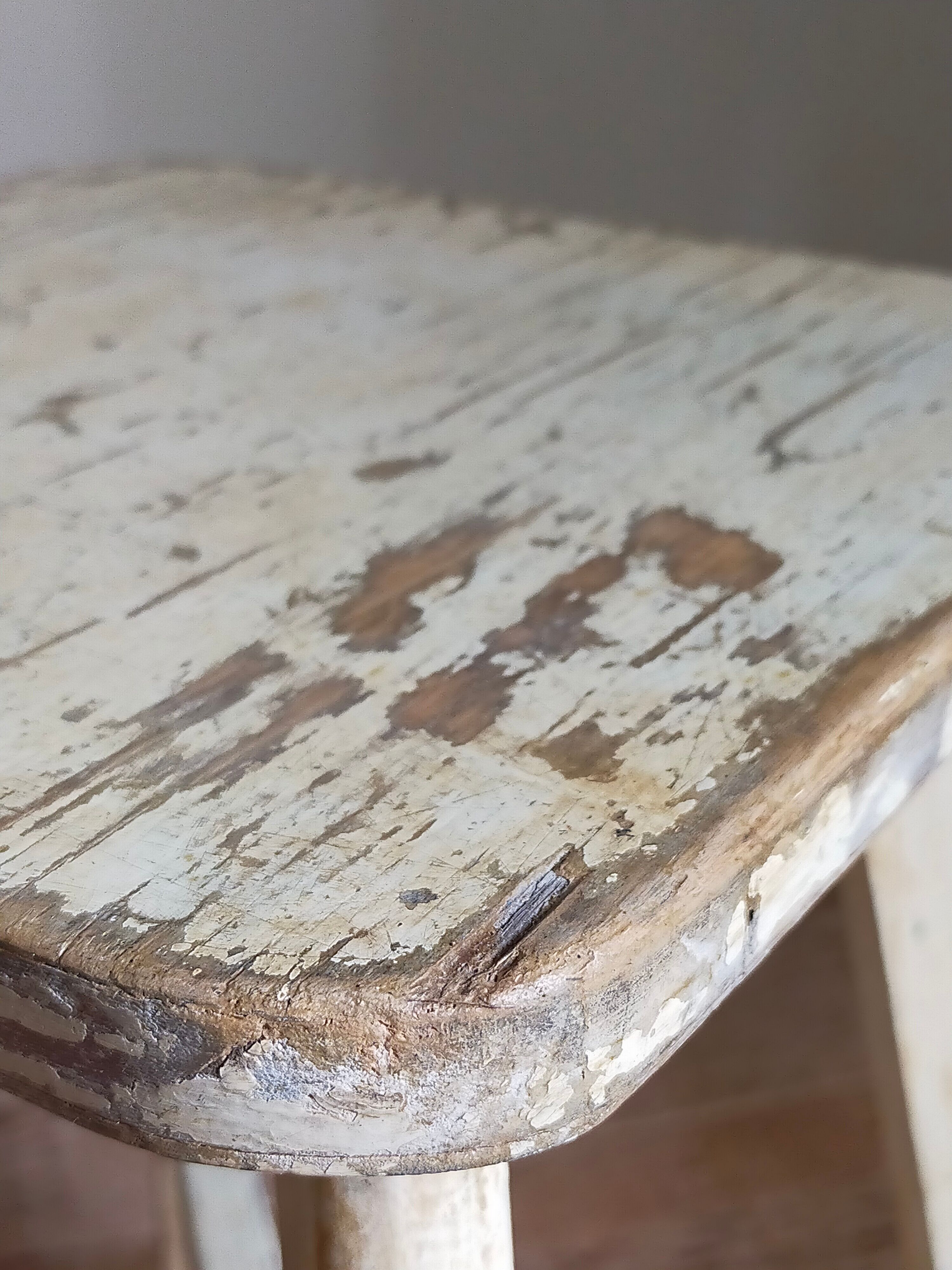 Old workshop stool in patinated solid wood