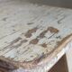 Old workshop stool in patinated solid wood