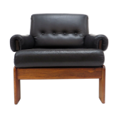 Vintage black leather armchair with solid rosewood frame made in the 1960s