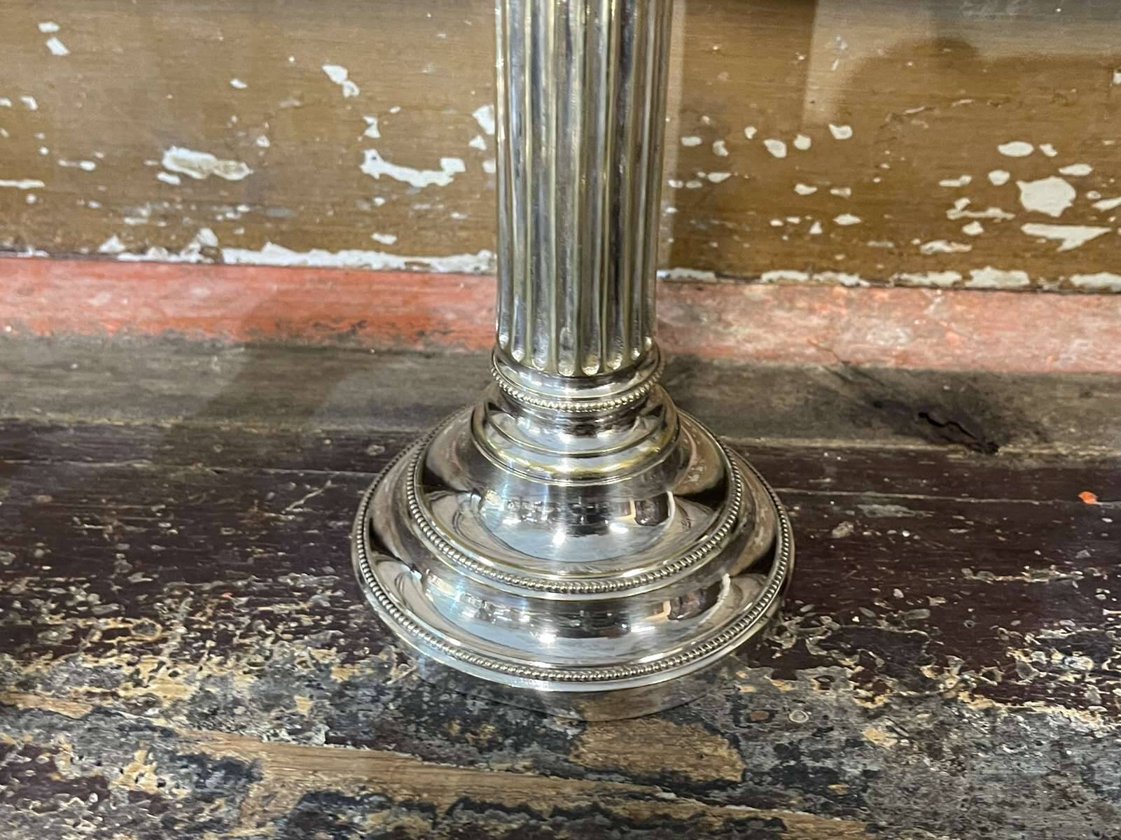 Pair of 2-branched candlesticks in silver metal