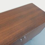 Vintage modernist enfilade in rosewood and chrome metal from the 60s and 70s.